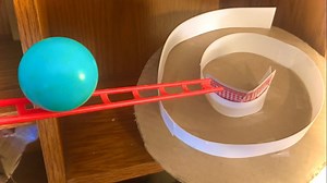 An Intricate Rube Goldberg Chain Reaction Machine With the Sole Purpose of Following a Blue Ball