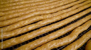 Meat sausage. The production process of thin sausages. Sausage production.