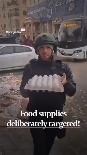 Israeli forces carried out a raid in the Shuafat refugee camp in occupied East Jerusalem, storming multiple homes, detaining several residents, and destroying approximately 13,000 eggs and food supplies, according to local sources. Footage from the raid shows an individual wearing a press-marked helmet smashing eggs on the ground during the operation. | Yeni Şafak