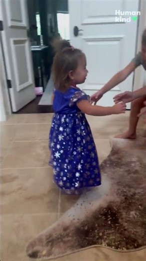 Watch four big brothers and dad go wild over little girl’s princess dress debut