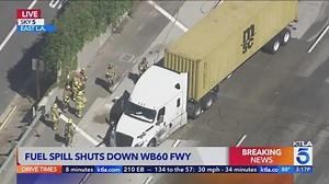 Crash, fuel spill closes 60 Freeway
