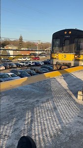LIRR Bombardier M7 passing through Massapequa on its way to Penn Station.