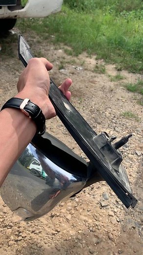 Damaged Car Mirror Inspection and Repair