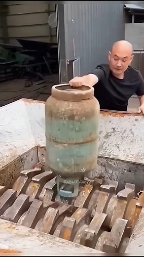 Why did the man put the cylinder inside it? 🤔