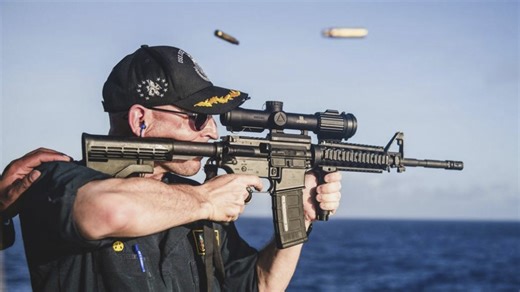 Navy commander relieved of duty after photo showed him firing rifle with scope backward