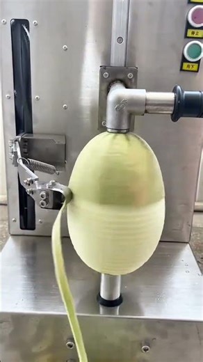 Industrial melon peeling machine rotating fruit to remove skin for commercial production