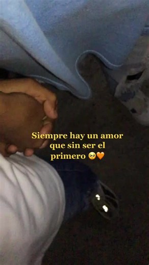 Affectionate Gesture of Unity Through Interlocked Hands