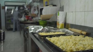 Kitchen with a cook in a fast food restaurant, background, professional, 4K