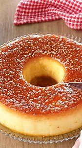 PUDIM DE TAPIOCA DE UM JEITO DIFERENTE E DELICIOSO Ingredientes: 1 xícara de açúcar (180g) 1/2 xícara de água (120ml) 100g de tapioca granulada 500ml de leite 3 ovos 1 caixinha de leite condensado (395g) 1 garrafinha de leite de coco (200ml) 1/2 pacotinho de coco ralado (25g) XICARA DE CHÁ (MEDIDA PADRÃO) CAPACIDADE LIQUIDA 240ML Modo de fazer: Acompanhe o passo a passo do vídeo. #receita #pudim #tapioca #mandioca #sobremesa | Receitas da Bina