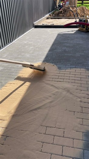 Watch the sand disappear into the joints 👀✨ #hardscape #satisfying #asmr #paving #shorts