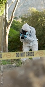 Photography, evidence and person on crime scene for inspection, investigation and proof documentation. Forensic photographer, tape and pictures for observation for problem solving and case research.