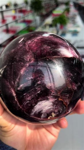 Purple mica, a rare and stunning variety of muscovite, is prized for its vibrant violet hues and shimmering pearlescent luster. This metamorphic mineral forms in layered sheets, making it flexible yet durable. Found primarily in Brazil, India, and Russia, it's used in cosmetics, paints, and spiritual practices due to its reflective properties. In crystal healing, purple mica is believed to enhance intuition, creativity, and emotional clarity. Its natural iridescence also makes it a favorite amon