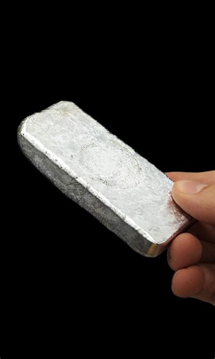 Melting soda cans into a metal bar | NileRed