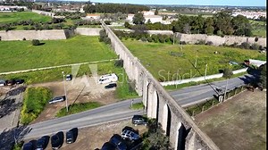 Bird eye view of stone Roman Aqueduct at historic Old Town of Évora, Portugal designed by Francisco de Arruda and built in the 1530s