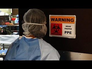 Inside look at morgue coping with virus deaths