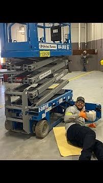 Changing out bad hydraulic pump on Scissor lift