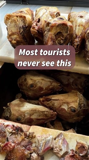 Most tourists run away from this, but some locals love it. This is Kelle, a traditional meal where a whole sheep's head is roasted until the meat is incredibly tender. And it has everything, the brain, the tongue, and yes... even the eye. Tag a friend who needs to see this! 👇 📍 More tips at turkeytravelplanner.com #kelle #turkishfood #streetfood #weirdfood #istanbul #travel
