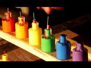 Bottles of Paint Exploding in Super Slow Motion