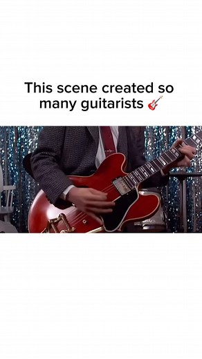 Daily Music on Instagram: "In Back to the Future (1985), there’s an iconic scene where Marty McFly, played by Michael J. Fox, performs „Johnny B. Goode“ at the Enchantment Under the Sea dance. It’s a huge moment in the movie - Marty, trying to ensure his parents fall in love and save his own future, grabs the guitar and rips into Chuck Berry’s classic 1958 rock ‚n‘ roll anthem. The funny twist is that „Johnny B. Goode“ technically hadn’t been released yet in 1955, when the movie is set. During t