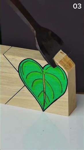 Chisel carves leaf—wood reveals vibrant hand-shaped detail 🍃🪵