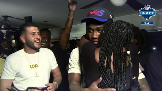 James Cook embraces older brother Dalvin with celebratory hug after being drafted by Bills