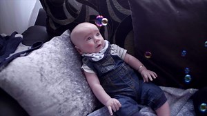 Sensory play with baby: Blowing bubbles