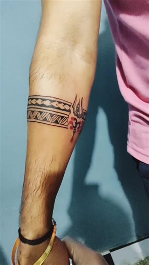 Unique Armband Tattoo Designs from Nepal, India, and Qatar