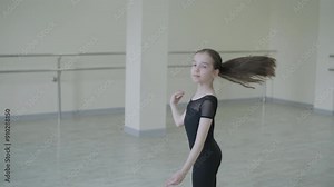 Young ballet girl at studio lesson. Training performance. Stretching exercise pose. Ballerina practice balance technique. Classical elegance fitness.