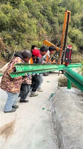 Install metal guardrails along the road