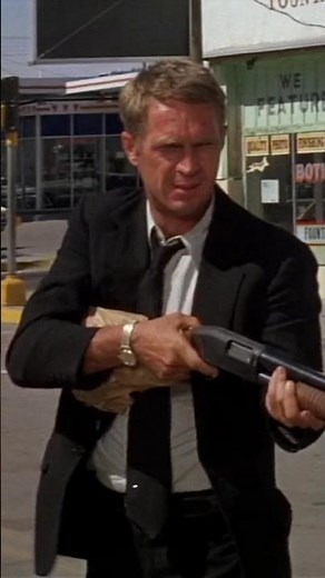 Steve McQueen uses a High Standard K-1200 Riot Standard. Ali MacGraw. The Getaway(1972)Sam Peckinpah