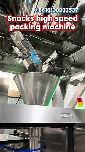 Snack packing machine, automatic packaging machinery for chips, puffed food granule snack packaging.