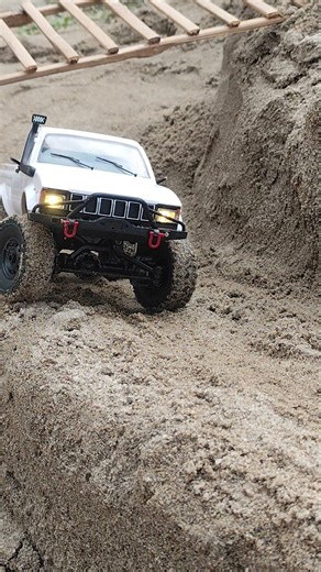 Mini RC playing offroad sand hills