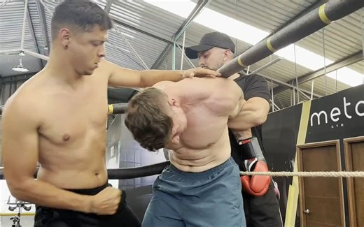 Boxer Receives Gut Punches and Shoulder Thrusts in the Ring