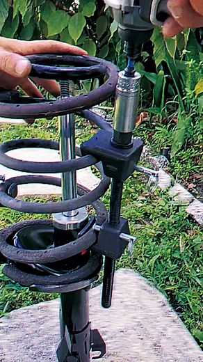 Assembling a Metal Spring and Nut Mechanism