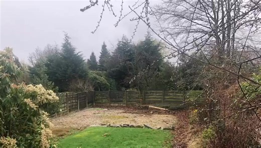 This client's garden had a huge problem with drainage, which we sorted with a soakway system. We then added contemporary fencing, artificial grass, composite decking, decorative stone | Insulating Brick