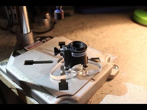 Simple and small Dremel router base attachment for making inlays.