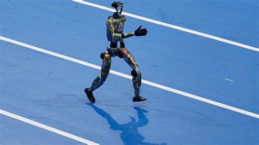 Running robot crashes into man on athletics track