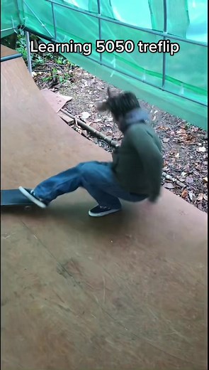 Learning 5050 kickflip thing
