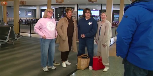 Iowans fly out of Des Moines for (slightly) warmer temperature