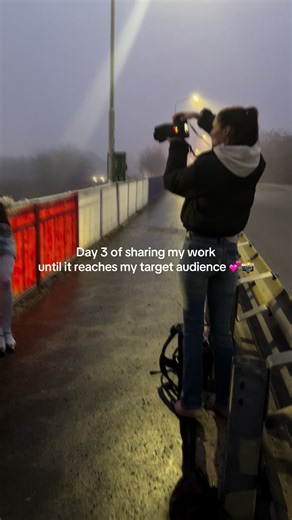 Model and Photographer Sharing Work