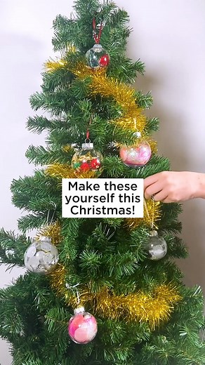 Create your own stylish handmade Christmas decorations this year with our DIY fillable baubles! With our huge range of baubles, scatters and fillers, the only limit is your imagination! What would you fill yours with? #spotlightstores #itswhatyoumakeit #makechristmasyours | Spotlight