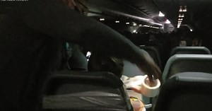 Passenger taped to seat after allegedly groping flight attendants
