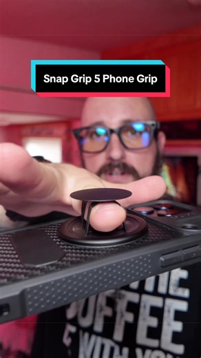 This is one of those upgrades you don’t realize you needed until you use it. The Snap Grip 5 Magnetic Phone Grip & Stand snaps on instantly with a strong MagSafe-style hold, makes one-hand texting & scrolling feel secure, and converts into a 360° rotating kickstand for watching videos, recording content, or video calls anywhere. Ultra-thin, modern design and compatible with iPhone & Android magnetic cases — perfect for everyday carry and mobile creators. #SnapGrip #ohsnap #phonegrip #tiktokshopc