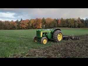 1957 John Deere 820 Discing