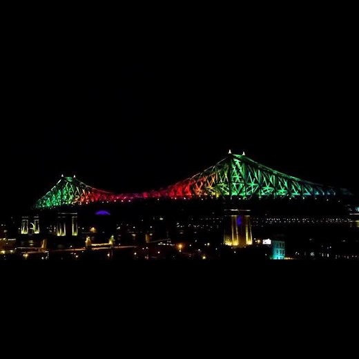 The Jacques Cartier bridge turning into a giant rainbow 🌈 #cavabienaller 🎥Moment Factory #LiveMTL | Live MTL