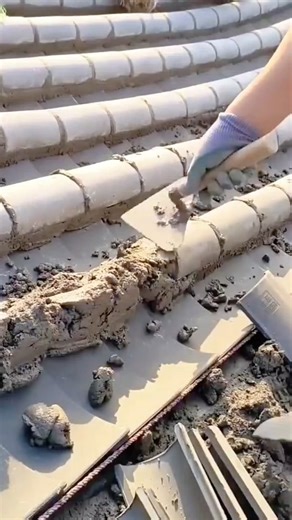 Roof Ridge Repair: Sealing Ceramic Tiles and Applying Mortar for a Durable Finish