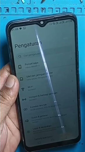 The headset logo keeps appearing on the Infinix Smart 6 cellphone.