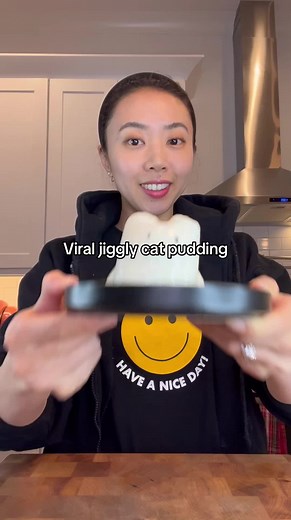 Jiggly cat pudding recipe ⬇️ 3/4 cup milk 1/2 cup heavy cream 2 tbsp sugar 1 packet of unflavored gelatin powder (0.25oz) 2 black sesame seeds for the eyes 1. In a small saucepan, combine milk, heavy cream, and sugar 2. Evenly sprinkle on the gelatin powder. Don’t let it clump when sprinkling it on 3. Let the gelatin powder to soften for ~30 - 60 secs 4. On low heat, whisk the mix continuously until gelatin powder is fully combined. No lumps! 5. If you see a lot of air bubbles after whisking, st