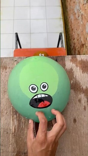 Experiment: Will the emoji water balloon explode if dropped from a height?