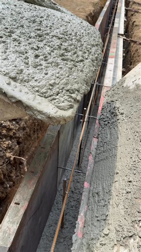 Pouring walls with a concrete buggy 😁 #concrete #construction | Real Concrete Solutions
